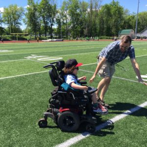 Oscar attended the Special Olympics for the first time this year, and while the event he participated in was disappointing (the whole day was disorganized and Oscar raced against manual chair users—no contest), the highlight of his day was that his third grade teacher attended and spent much of the day racing him on the track!